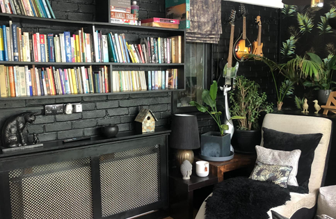 Black internal painted brickwork showing specialized painting techniques