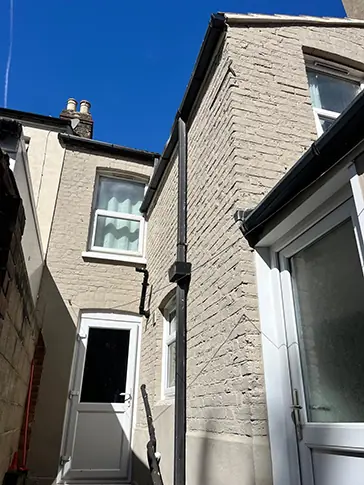 Exterior brickwork painted in fresh taupe