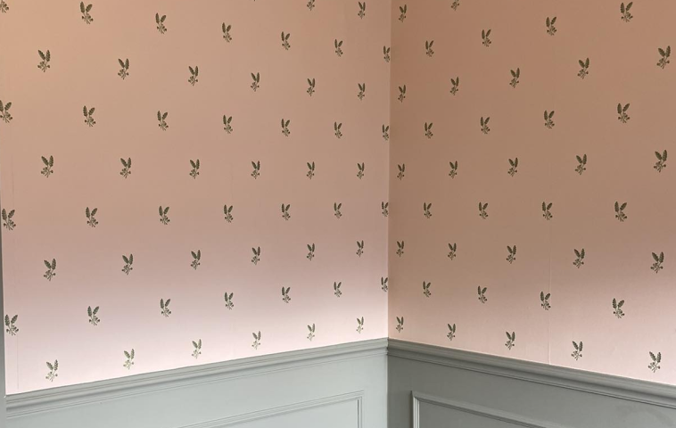 Expertly hung wallpaper showing professional installation and pattern matching